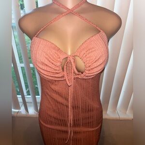 Blush color dress with spaghetti straps and a front side split in a size Large